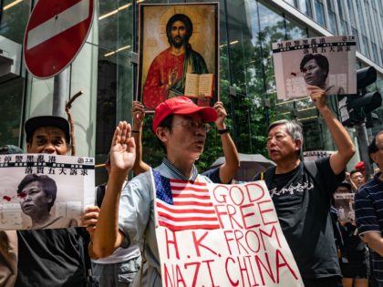 HONG KONG, CHINA - AUGUST 31: Protesters take part in an anti-government rally as they march on a street in Central district on August 31, 2019 in Hong Kong, China. Pro-democracy protesters have continued rallies on the streets of Hong Kong against a controversial extradition bill since 9 June as …