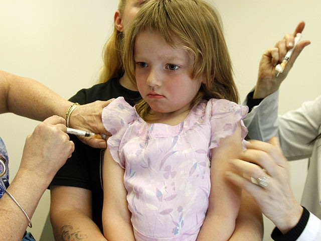 In this April 20, 2012, photo, Holly Ann Haley, 4, gets vaccinations at the doctor's office in Berlin, Vt. Vermont continues to be embroiled in a debate over ending the philosophical exemption that allows parents to have their kids skip the immunizations required for most children to attend school. (AP …