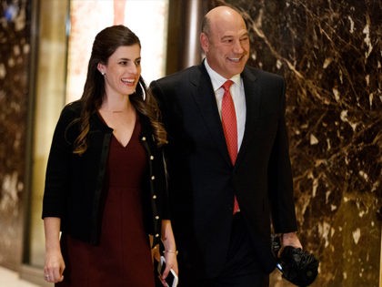 Goldman Sachs COO Gary Cohn, right, is escorted by Madeline Westerhout to a meeting with President-elect Donald Trump at Trump Tower, Tuesday, Nov. 29, 2016, in New York. (AP Photo/Evan Vucci)