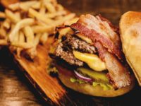 Democrat 2020 presidential candidates urged Americans on Wednesday to eat less beef to help ward off climate change, proposing some level of government intervention to help it happen.