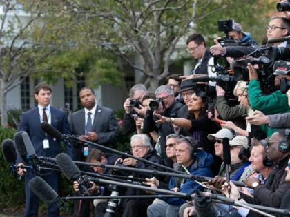 In original photo, President Donald J. Trump talks with reporters along the South Lawn of