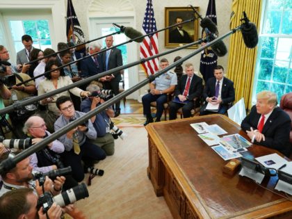 WASHINGTON, DC - SEPTEMBER 04: U.S. President Donald Trump (R) talks to reporters followin