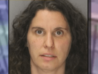 Rebecca Dalelio was arrested Friday evening after throwing a red liquid in a feminine hygiene device from the California Senate public gallery onto the Senate floor, the California Highway Patrol said.