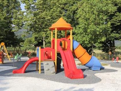 Children's school playground with slides and swings