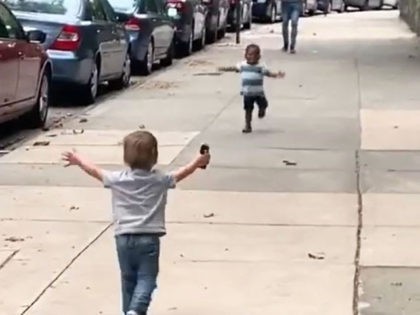toddlers running toward each other