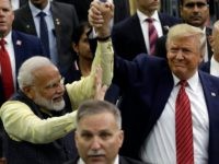 President Donald Trump and Indian Prime Minister Narendra Modi walk around NRG Stadium waving to the crowd during the "Howdy Modi: Shared Dreams, Bright Futures" event, Sunday, Sept. 22, 2019, in Houston. (AP Photo/Evan Vucci)