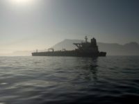Iran says to stick to nuclear deal for $15 bn oil credit