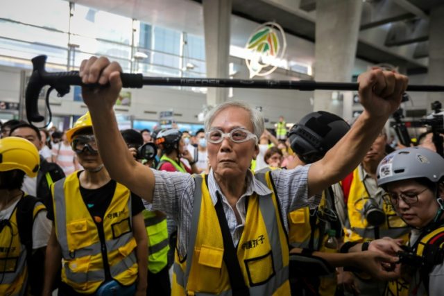 Hong Kong's grandpa protesters speak softly but carry a stick