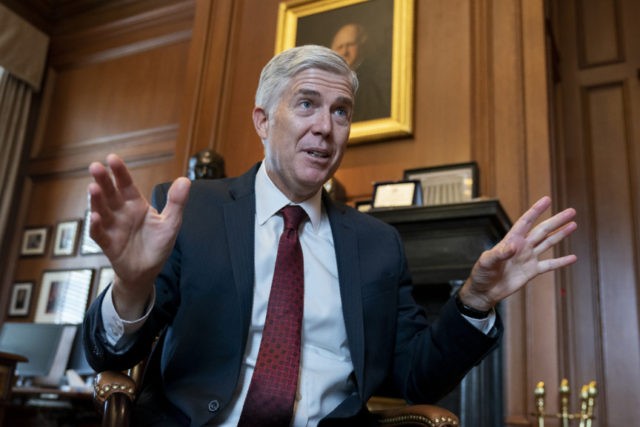 Supreme Court Gorsuch Neil Gorsuch Associate Justice Neil Gorsuch, President Donald Trump's first appointee to the high court, speaks to The Associated Press about events that have influenced his life and the loss of civility in public discourse, in his chambers at the Supreme Court in Washington, Wednesday, Sept. 4, 2019. Gorsuch has written a new book on the importance of civics and civility, and a defense of his preferred originalism method of interpreting laws and the Constitution. (AP Photo/J. Scott Applewhite) The Associated Press