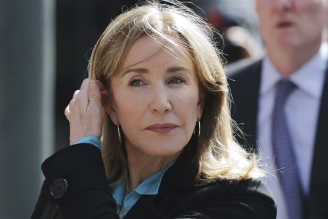 College Admissions Bribery Felicity Huffman In this April 3, 2019 file photo, actress Felicity Huffman arrives at federal court in Boston to face charges in a nationwide college admissions bribery scandal. Huffman, who pleaded guilty to a single count of conspiracy and fraud in May, is returning for sentencing in federal on Friday, Sept. 13, 2019 court in Boston. (AP Photo/Charles Krupa, File) The Associated Press