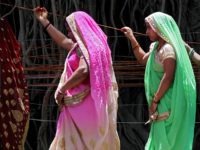 TOPSHOT - Married Indian women perform rituals on a sacred Banyan tree on the occasion of "Vat Savitri Puja" festival, in Jabalpur on June 3, 2019. - The "Vat Savitri Puja" festival is an auspicious day in Hinduism when married women observe fast and pray for their husband's health and …