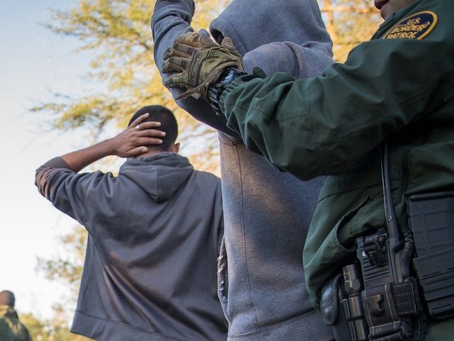 U.S. Border Patrol agents arrest illegal aliens attempting to enter the United States after crossing the Rio Grande River in McAllen, Texas on November 15, 2018. Photo by Ozzy Trevino
