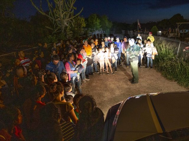 U.S. Border Patrol agents assigned to the McAllen border patrol station encounter a large group of migrants near Los Ebanos, Texas, June 15, 2019. The members of the group who illegally entered the U.S. by crossing the Rio Grande on rubber rafts turned themselves into the U.S. Border Patrol agents …