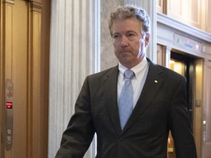 Sen. Rand Paul, R-Ky., walks to the Senate as an 11th-hour Republican rescue mission to keep President Donald Trump from a Senate defeat on his signature issue of building barriers along the southwest border seems near collapse, at the Capitol in Washington, Wednesday, March 13, 2019. (AP Photo/J. Scott Applewhite)