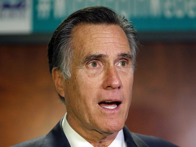FILE - In this Jan., 18, 2019, file photo, U.S. Sen. Mitt Romney, R-Utah, speaks with reporters, in Ogden, Utah. Romney said Friday, June 7, 2019, that he's not sure if he will endorse President Donald Trump for a second term and that he may not throw his weight behind …