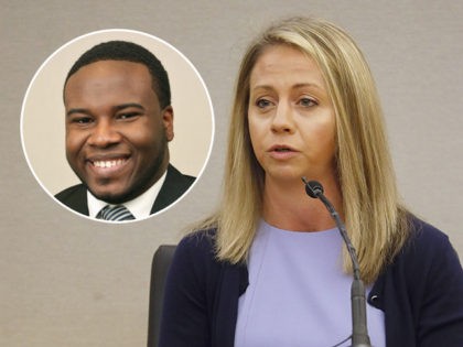 Fired Dallas Police Officer Amber Guyger faces the jury and answers questions from her counsel in her own murder defense in the 204th District Court at the Frank Crowley Courts Building in Dallas, Friday, Sept. 27, 2019. Guyger shot and killed Botham Jean, an unarmed 26-year-old neighbor in his own …