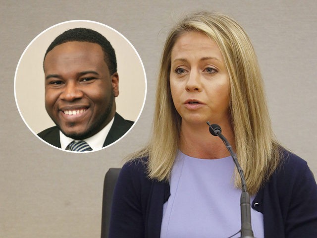 Fired Dallas Police Officer Amber Guyger faces the jury and answers questions from her cou