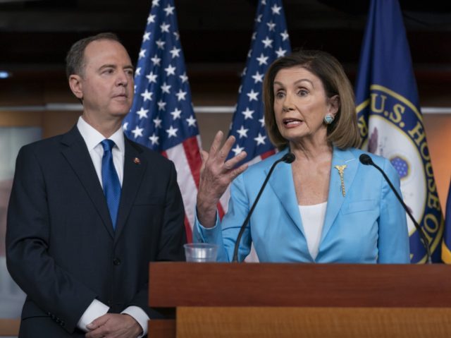 Speaker of the House Nancy Pelosi, D-Calif., is joined by House Intelligence Committee Chairman Adam Schiff, D-Calif., at a news conference as House Democrats move ahead in the impeachment inquiry of President Donald Trump, at the Capitol in Washington, Wednesday, Oct. 2, 2019. (AP Photo/J. Scott Applewhite)