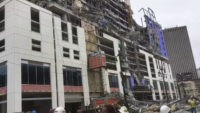 This photo provided by WWL-TV shows several construction standing after a large portion of the Hard Rock Hotel, under construction suddenly collapsed Saturday, Oct. 12, 2019 in New Orleans. It was not immediately clear what caused the collapse or if anyone was injured. Upper floors began to fall on top …