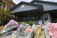 Bouquets of flowers and stuffed animals are piling up outside the Fort Worth home Monday, Oct. 14, 2019, where a 28-year-old black woman was shot to death by a white police officer. Members of the community have brought tributes to the home where Atatiana Jefferson was killed early Saturday by …