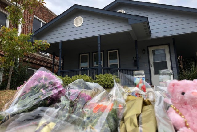 Bouquets of flowers and stuffed animals are piling up outside the Fort Worth home Monday,