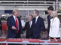 President Donald Trump tours the Louis Vuitton Workshop Rochambeau in Alvarado, Texas, Thursday, Oct. 17, 2019, with Bernard Arnault, chief executive of LVMH, third from right, Alexandre Arnault, second from right and Ivanka Trump. (AP Photo/Andrew Harnik)