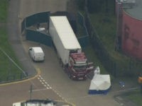 An aerial view as police forensic officers attend the scene after a truck was found to contain a large number of dead bodies, in Thurock, South England, early Wednesday Oct. 23, 2019. Police in southeastern England said that 39 people were found dead Wednesday inside a truck container believed to …