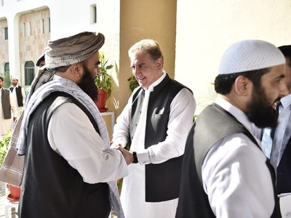 In this photo released by the Foreign Office, Pakistan's Foreign Minister Shah Mehmood Qureshi, center, receives members of Taliban delegation at the Foreign Office in Islamabad, Pakistan, Thursday, Oct. 3, 2019. Senior Taliban leaders are meeting with Qureshi in Islamabad as part of a push to revive an Afghanistan peace …