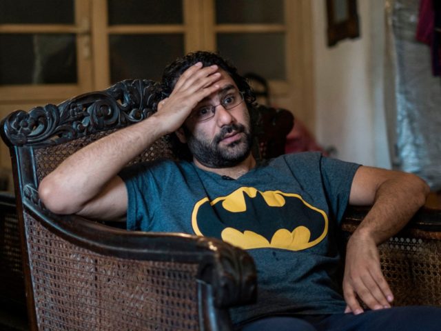 Egyptian activist and blogger Alaa Abdel Fattah gives an interview at his home in Cairo on May 17, 2019. - The days and nights of Alaa Abdel Fattah, Egypt's leading dissident, follow a disorienting rhythm where he is freed every morning from a filthy prison cell and then jailed again …