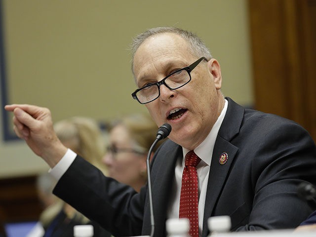 Rep. Andy Biggs, R-Ariz., gestures while speaking before the House Oversight Committee hearing on family separation and detention centers, Friday, July 12, 2019 on Capitol Hill in Washington. (AP Photo/Pablo Martinez Monsivais)