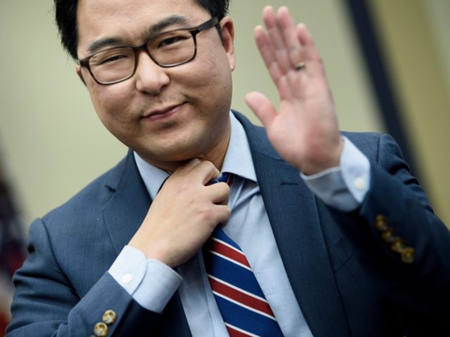 US Representative-elect Andy Kim (D-NJ) reacts after drawing a number during an office lot