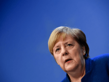 Germany's Chancellor Angela Merkel addresses media representatives at a press conference d