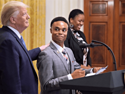 WASHINGTON, DC - OCTOBER 04: U.S. President Donald Trump invites U.S. Army veteran Ben Okereke, President of the Turning Points USA chapter at Georgia State University, to speak during an even for the Young Black Leadership Summit in the East Room of the White House October 04, 2019 in Washington, …