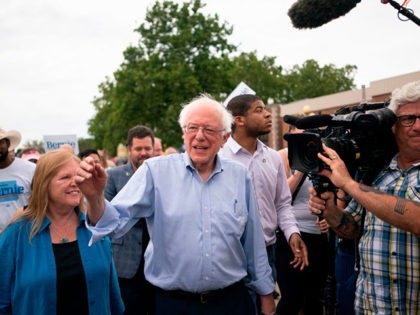 Democratic 2020 presidential candidate Senator Bernie Sanders (I-VT) greets people as he walks with reporters through the Iowa State Fair in Des Moines, Iowa on August 11, 2019 (Photo by ALEX EDELMAN / AFP) (Photo credit should read ALEX EDELMAN/AFP/Getty Images)