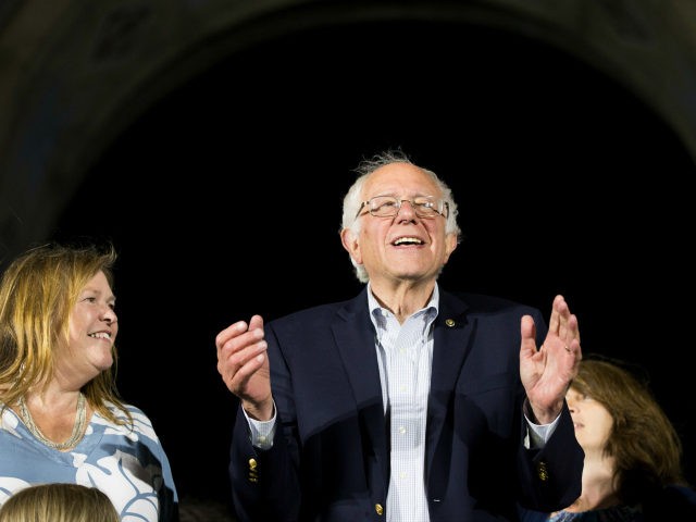 Democratic presidential candidate Senator Bernie Sanders dances at a GOTV concert and campaign rally at the Los Angeles Memorial Coliseum on June 4, 2016 in Los Angeles, California. / AFP / JONATHAN ALCORN (Photo credit should read JONATHAN ALCORN/AFP/Getty Images)