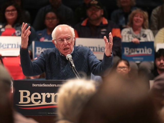 Democratic presidential candidate Sen. Bernie Sanders (I-VT) speaks to guests during a cam
