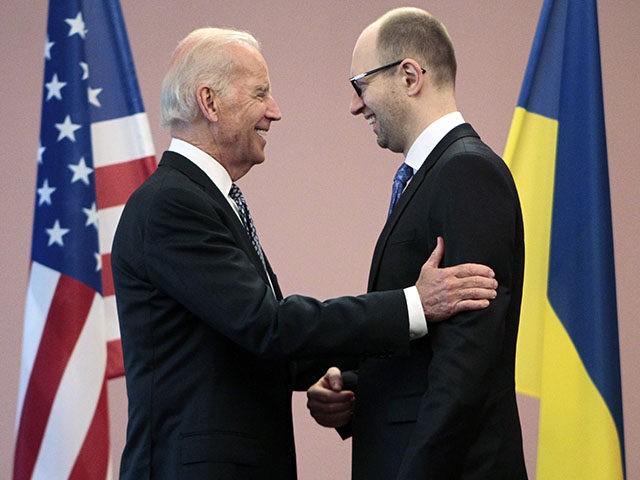 U.S. Vice President Joe Biden, left, talks with Ukrainian Prime Minister Arseniy Yatsenyuk