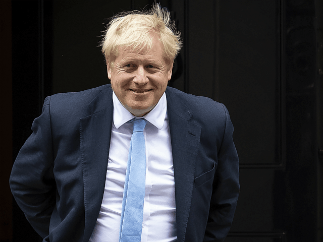 LONDON, ENGLAND - OCTOBER 15: UK Prime Minister Boris Johnson waits to welcome NATO Secretary General Jens Stoltenberg to 10 Downing Street on October 15, 2019 in London, England. (Photo by Dan Kitwood/Getty Images)