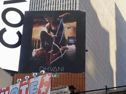 A billboard in New York City's Time Square depicts President Donald Trump being hogtied by a woman clad in athletic wear on Friday, Oct. 18, 2019. The The 30-foot-high billboard is part of an advertising campaign by Dhvani, a Portland-based clothing company. CEO of Dhvani Avi Brown told The Associated …