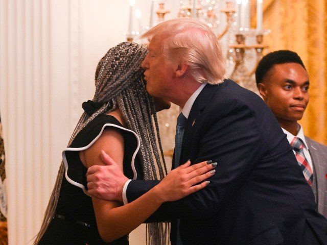Donald Trump embraces black TPUSA member