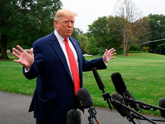 US President Donald Trump speaks to the press as he departs the White House in Washington, DC, for Florida on October 3, 2019. - Trump said Thursday he would "certainly" think about approaching Chinese leader Xi Jinping to investigate the US president's domestic political rival Joe Biden. Trump told reporters …