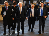 LONDON, ENGLAND - JANUARY 17: Owen Patterson MP (L), Former Secretary of State for Exiting the European Union David Davis MP (C), Mark Francois MP (2nd, R) and Steve Baker MP (R) arrives at the cabinet office on January 17, 2019 in London, England. After defeating a vote of no …