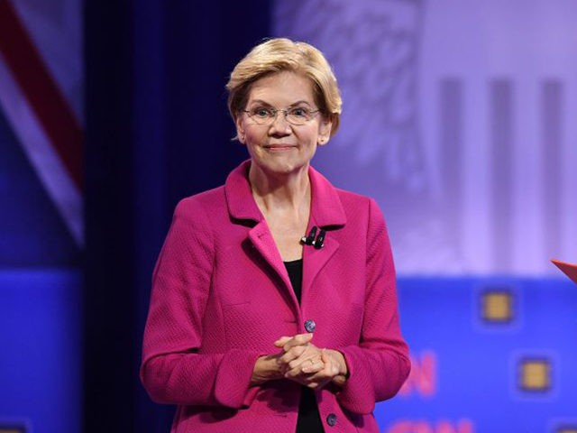 Democratic presidential hopeful Massachusetts Senator Elizabeth Warren (L) gestures as she speaks alongside CNN moderator Chris Cuomo during a town hall devoted to LGBTQ issues hosted by CNN and the Human rights Campaign Foundation at The Novo in Los Angeles on October 10, 2019. (Photo by Robyn Beck / AFP) …