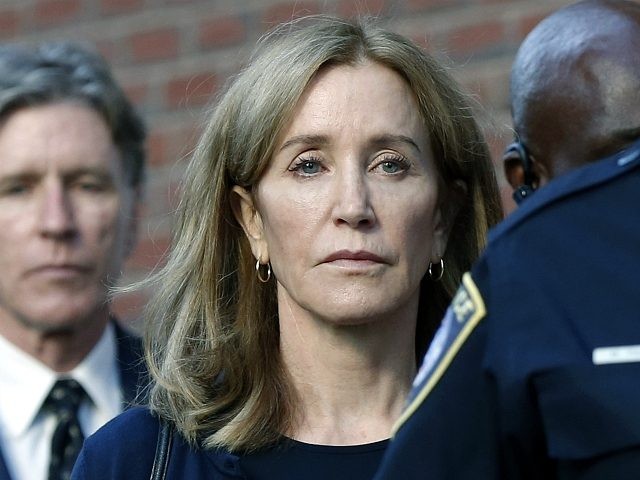 Felicity Huffman leaves federal court with her brother Moore Huffman Jr. following, after
