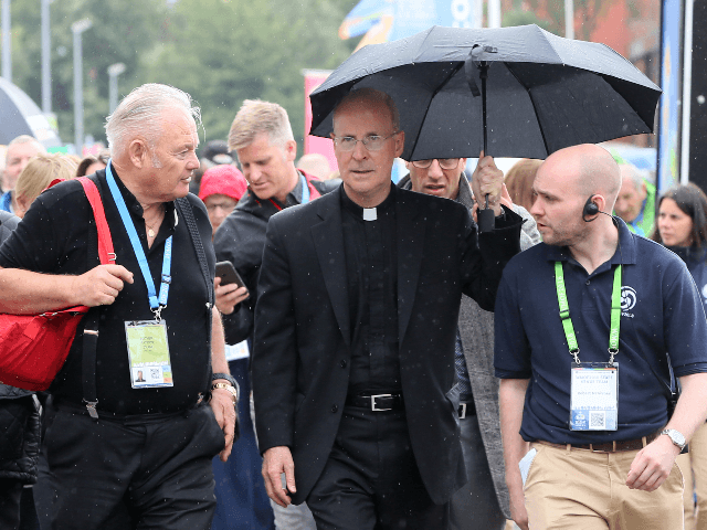 US Jesuit priest James Martin (C) arrives at the World Meeting of Families in Dublin on Au