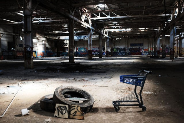 WATERBURY, CT - OCTOBER 21: The remaining interior of a shuttered factory connected to the brass industry stands in what was once a vibrant manufacturing city on October 21, 2018 in Waterbury, Connecticut. Known as "Brass City", Waterbury, like many manufacturing cities in America, started to see a decline in …