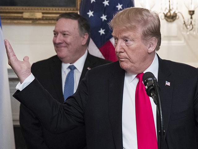 WASHINGTON, DC - MARCH 25: (AFP OUT) US President Donald J. Trump (C) delivers remarks, flanked by US Secretary of State Mike Pompeo (L) and US Vice President Mike Pence (R), while hosting Prime Minister of Israel Benjamin Netanyahu (unseen) in the Diplomatic Reception Room of the White House March 25, 2019 in Washington, DC. Trump signed an order recognizing Golan Heights as Israeli territory.Netanyahu is cutting short his visit to Washington due to a rocket attack in central Israel that had injured seven people. (Photo by Michael Reynolds - Pool/Getty Images)