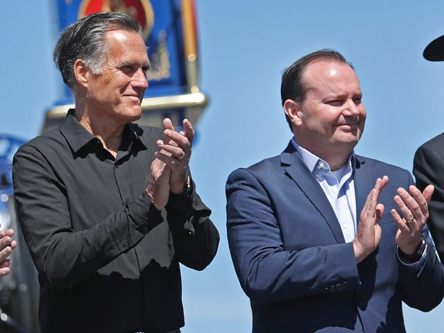 PROMONTORY, UT - MAY 10: Utah U.S. Senators Mitt Romney (2nd L) and Mike Lee (2ndR) , take part in the 150th anniversary of the driving of the Golden Spike on May 10, 2019 in Promontory, Utah. The driving of the Golden Spike completed the Transcontinental Railroad that liked both …