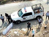 EDITORS NOTE: Graphic content / Forensic experts, investigators of the prosecution office and policemen work at the crime scene next to a man's corpse in Acapulco, Guerrero State, Mexico, on May 21, 2019. - The first quarter of the year set a new record for homicides in Mexico where violent …