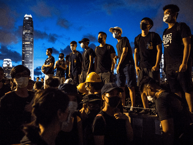 Protesters gather outside the government headquarters in Hong Kong on July1, 2019. - Hundr